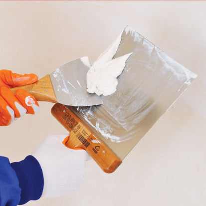 Spatulă lată pentru chit