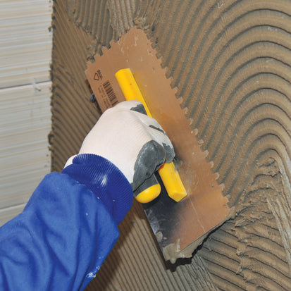 Gletieră zimțată, cu dinți pătrați și mâner deschis din plastic